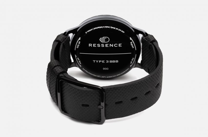 A photograph of the black Ressence watch with honeycomb strap