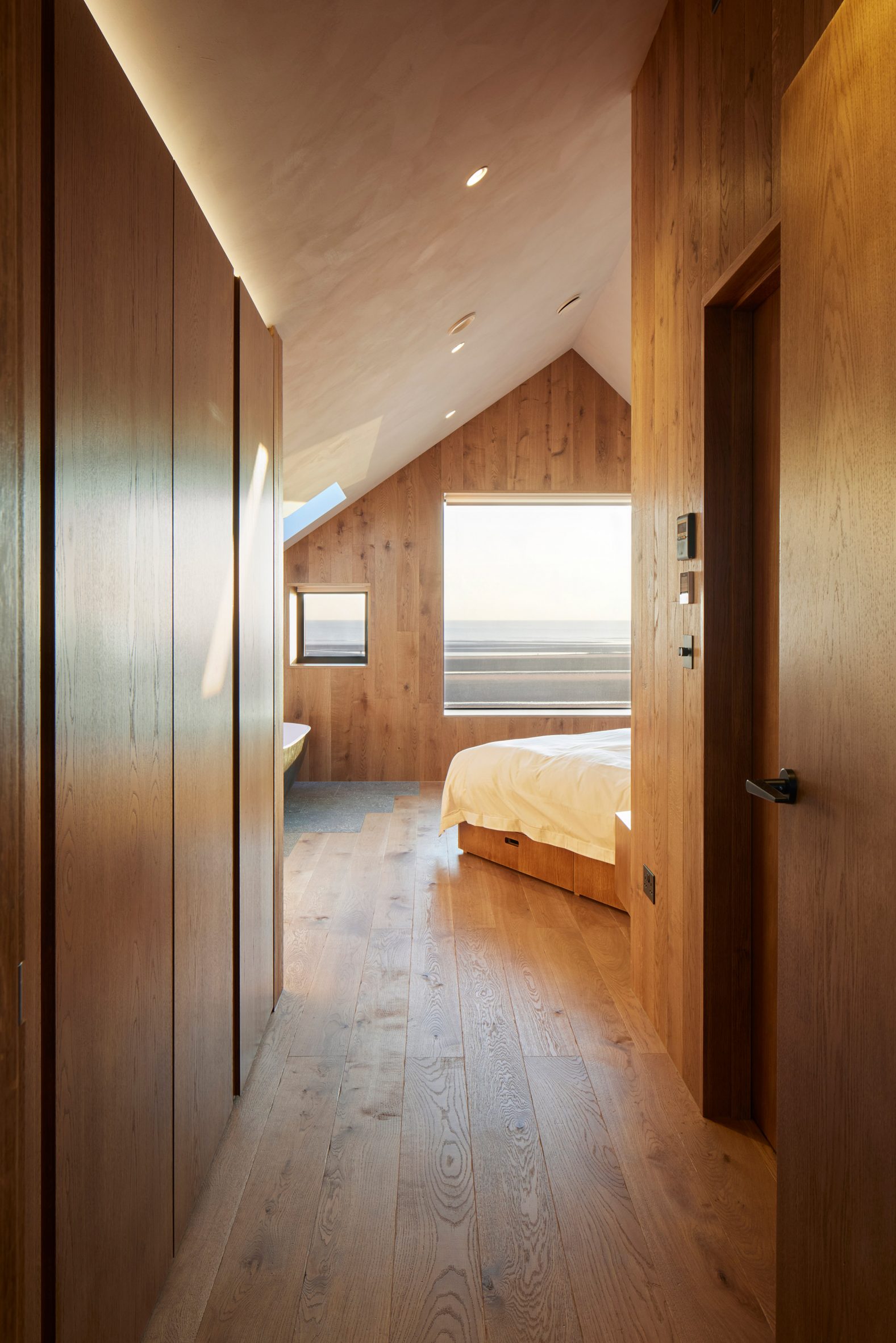 Wood-lined bedroom