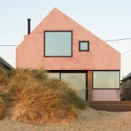 Pink concrete covers "fun house" on English coast by RX Architects