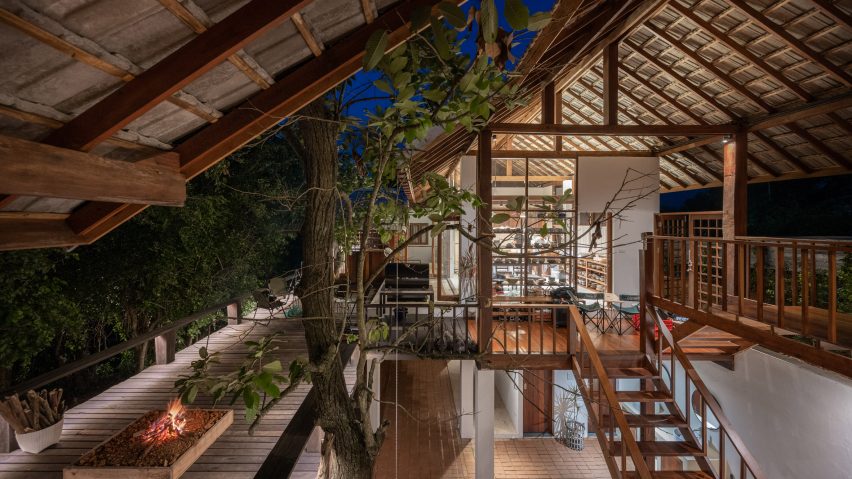 Interiors at Khiankai Home and Studio are connected by wooden walkways