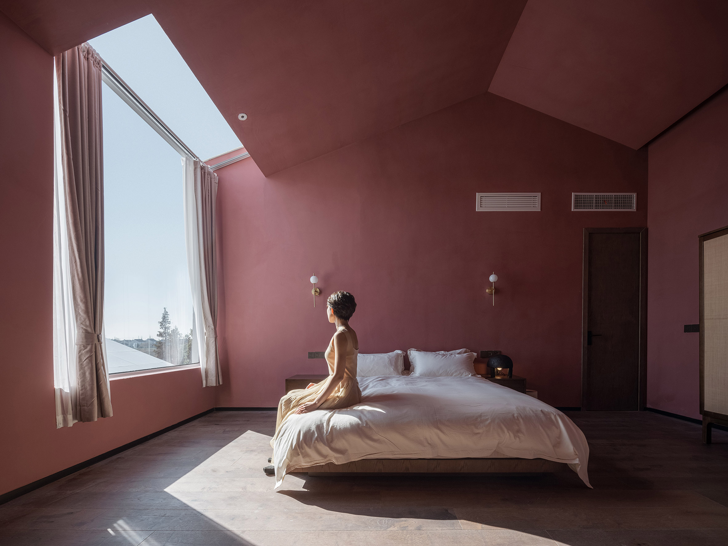 Red room in The White Section Homestay by Wutopia Lab