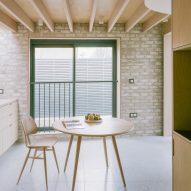 Kitchen-diner with grey-brick walls