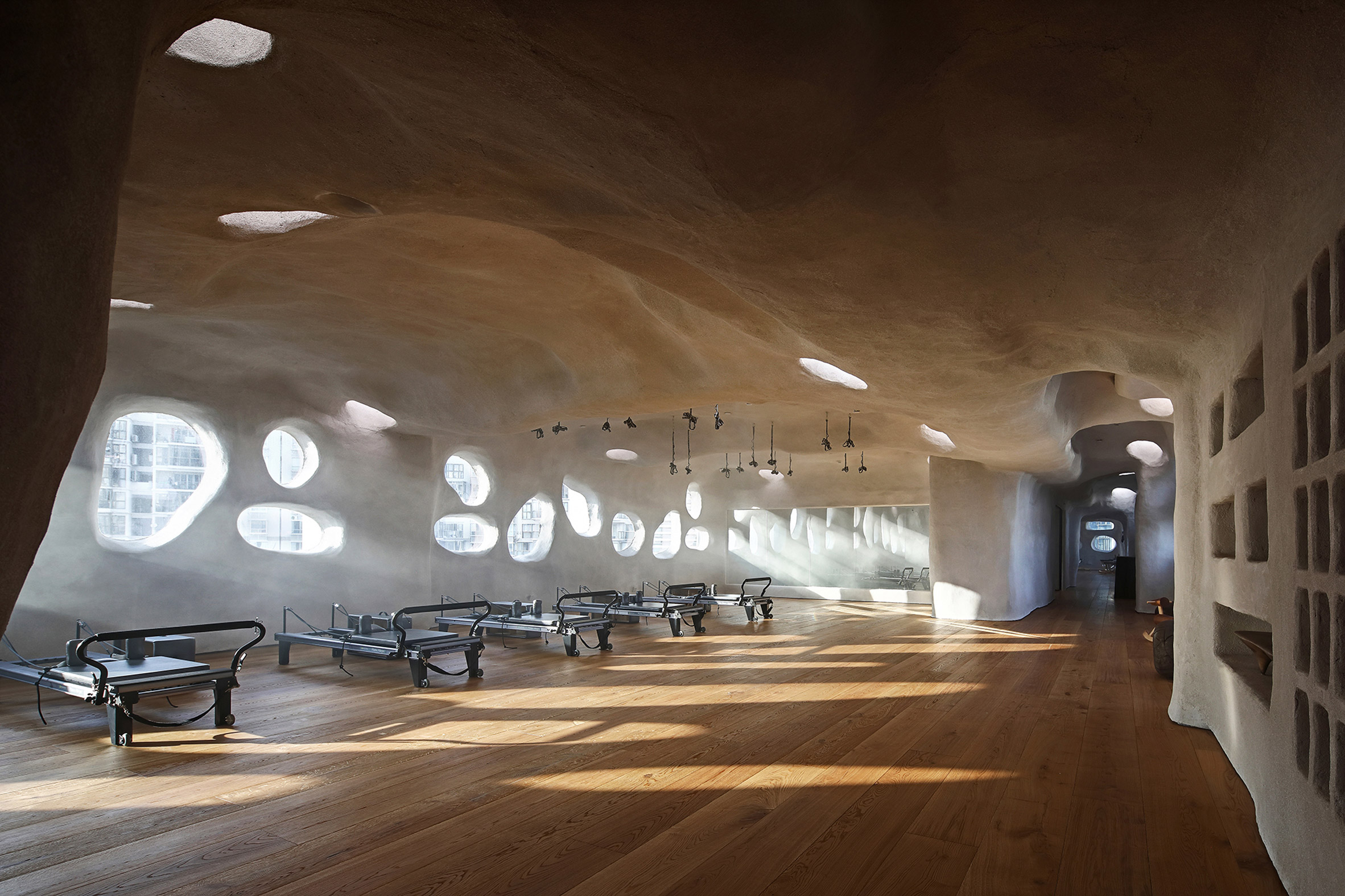 T.T. Pilates studio in Xiamen features cave-like interiors