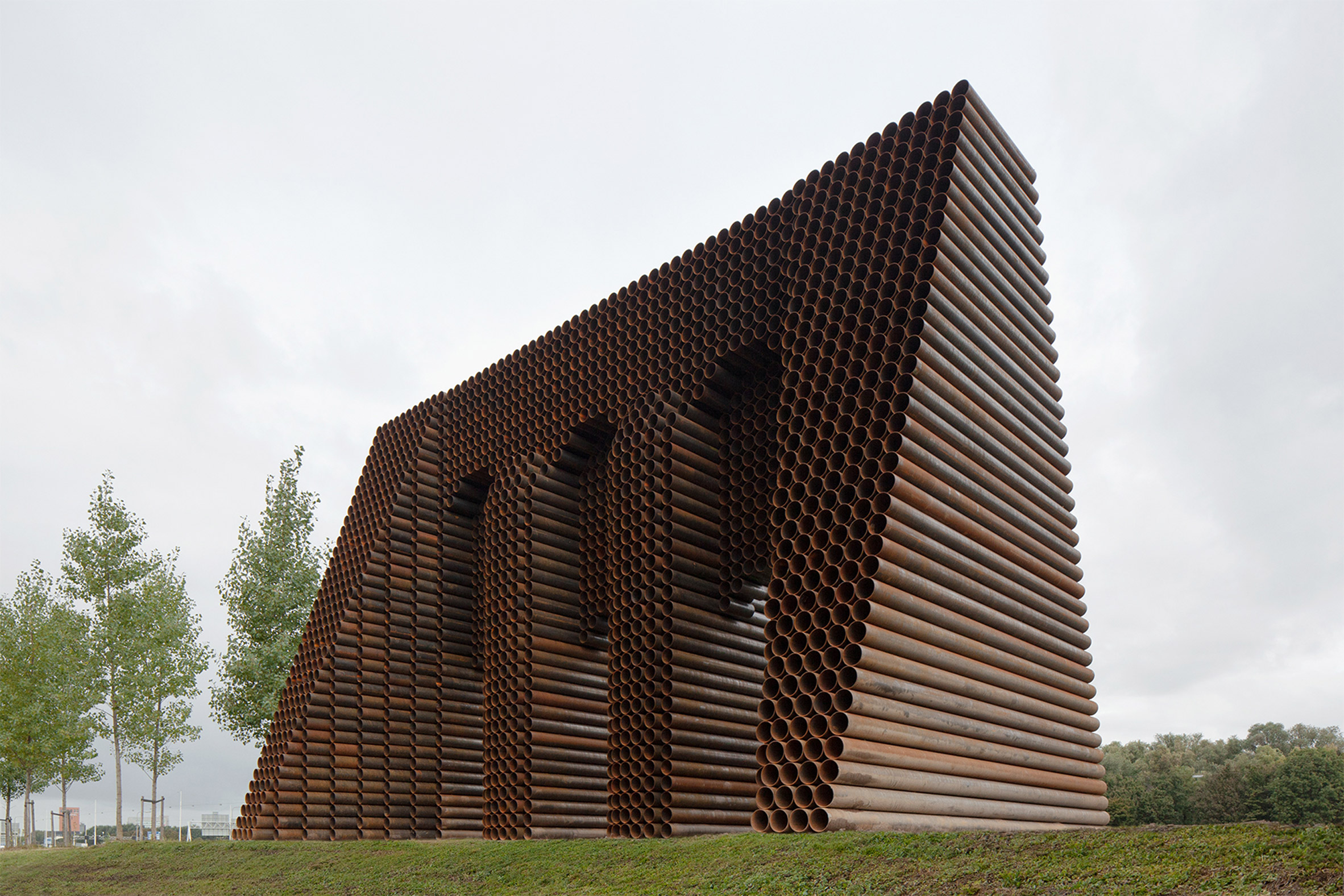 Waterline Monument stacked steel tubes are laid horizontally 