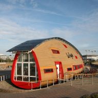 Will Alsop's upside-down-boat cafe becomes British Isles' "youngest listed building"