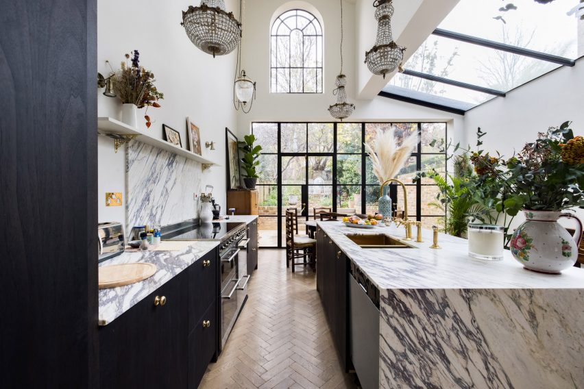 A photograph of a townhouse's marble kitchen