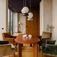 Dining room inside Berlin apartment designed by Gisbert Poppler
