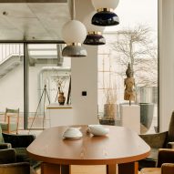 Dining room inside Berlin apartment designed by Gisbert Poppler