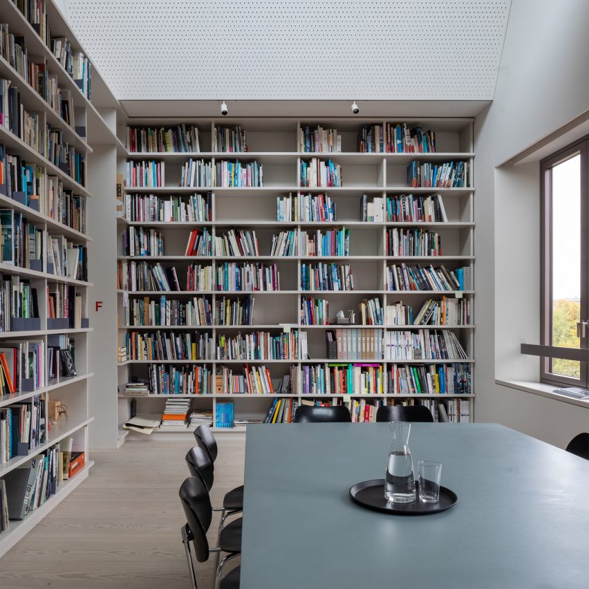 Office with floor-to-ceiling bookshelves