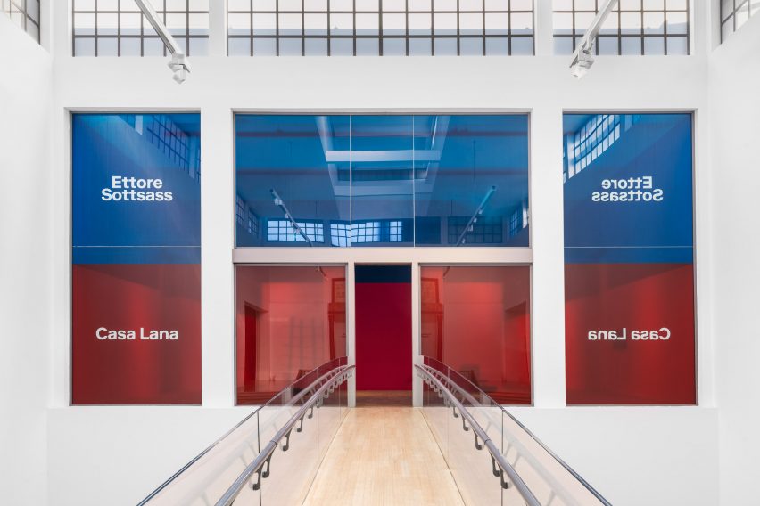 Entrance to Casa Lana: Ettore Sottsass exhibition at Triennale di Milano, Italy with blue and red resin panels