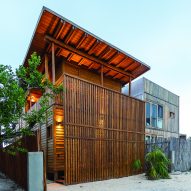 RED Arquitectos builds Casa Numa from coconut-palm wood