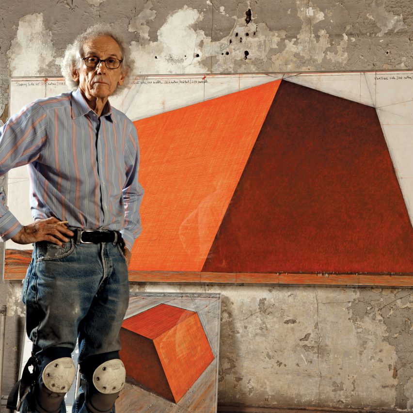 Christo in front of a sketch for The Mastaba