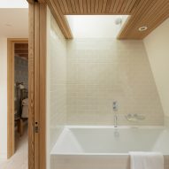 Bathroom interior of Danish Mews House by Neil Dusheiko Architects