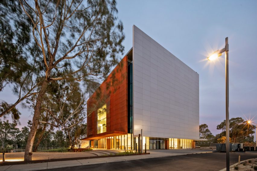 The Shepparton Art Museum is lit by warm lighting at dusk