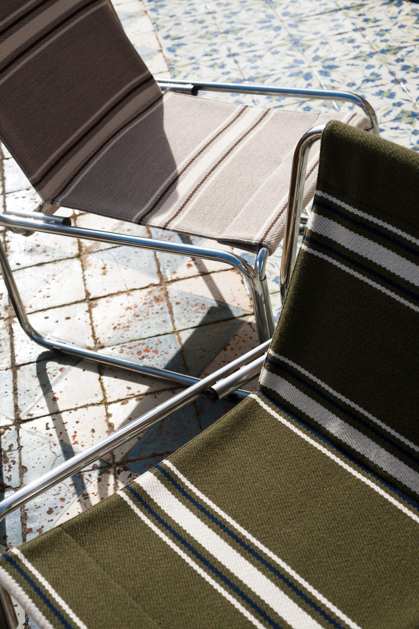 Regimental Geometric pattern fabric by Dedar in green and white stripes used on folding chairs