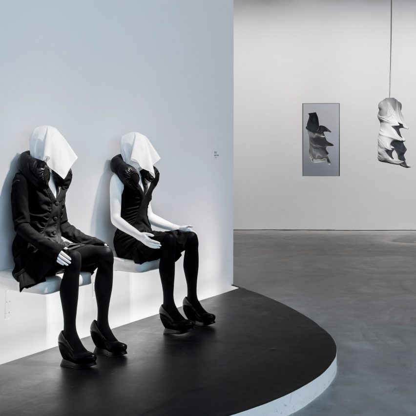 Image of Chalayan dressed mannequins placed against a wall