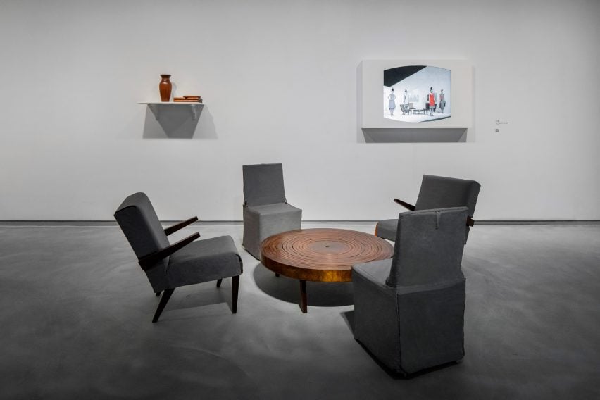 Furniture which doubles as clothing is positioned as a seating area