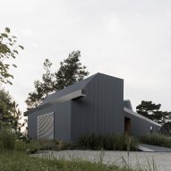 House clad with corrugated metal