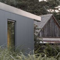 House clad with corrugated metal