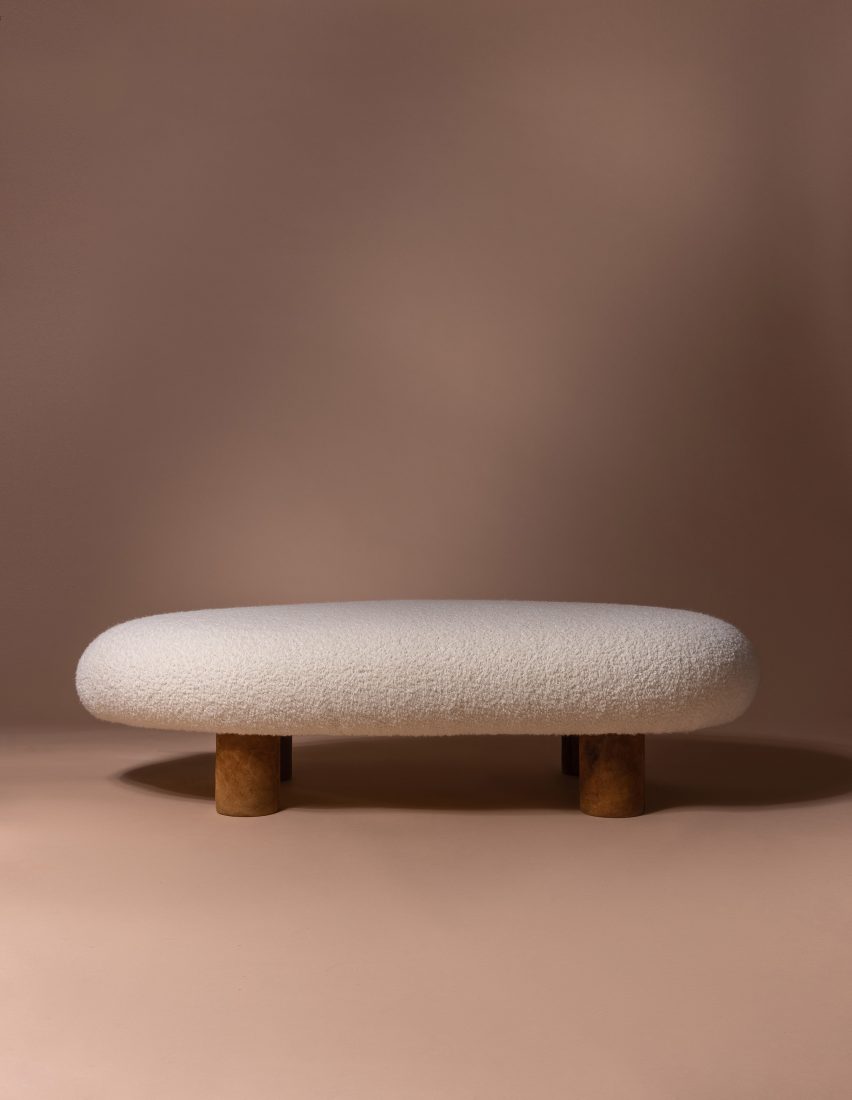 Bench with white seat and brown legs by Mari Koppanen