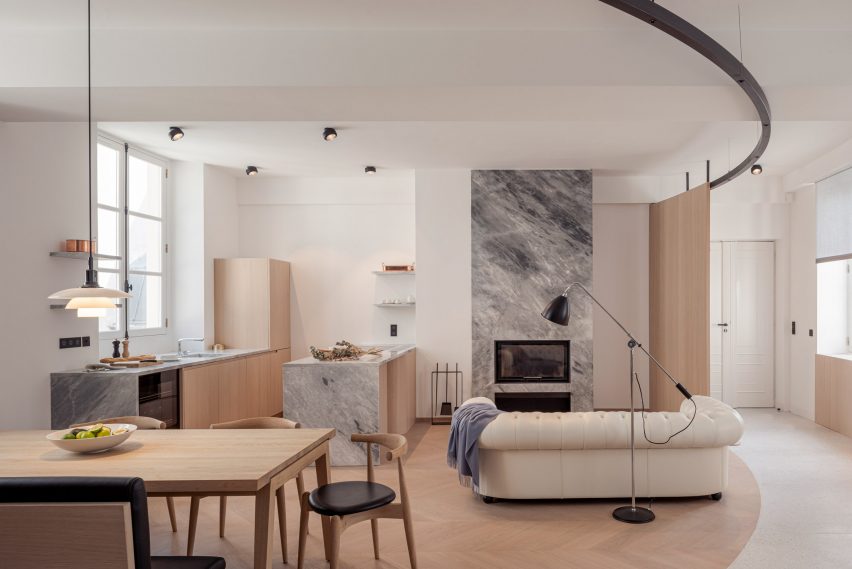 Living room and kitchen in Le Marais apartment, Nicolai Paris by NOA