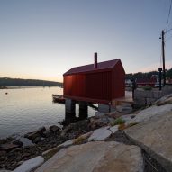 Red cabin on Norwegian seafront