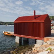 Handegård Arkitektur designs red cabin on Norwegian seafront