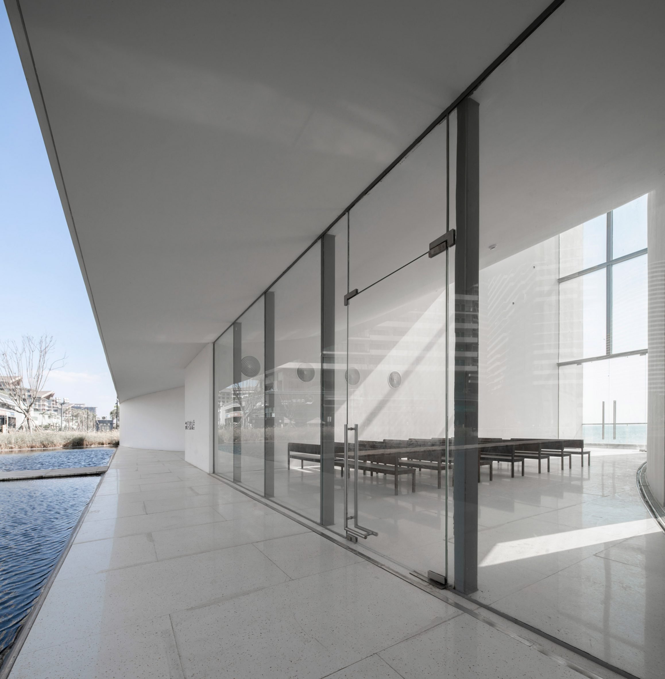 Glazed walls provide views out to the waterfront