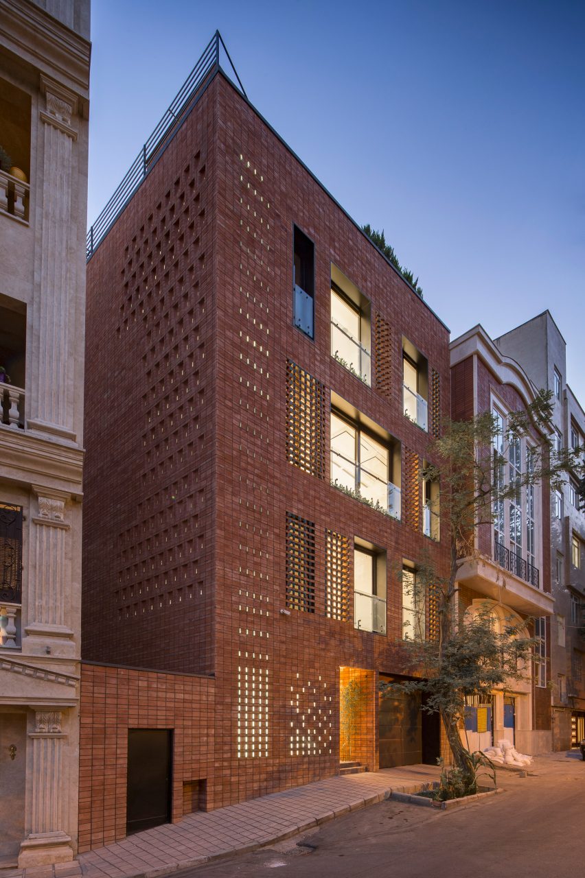 Residential building with brick and glass facade 