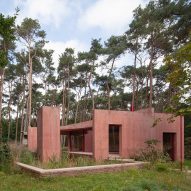 NWLND Rogiers Vandeputte contrasts red concrete pool house with green landscape