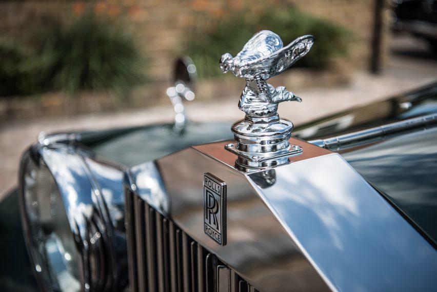A Rolls-Royce kneeling figurine on a car