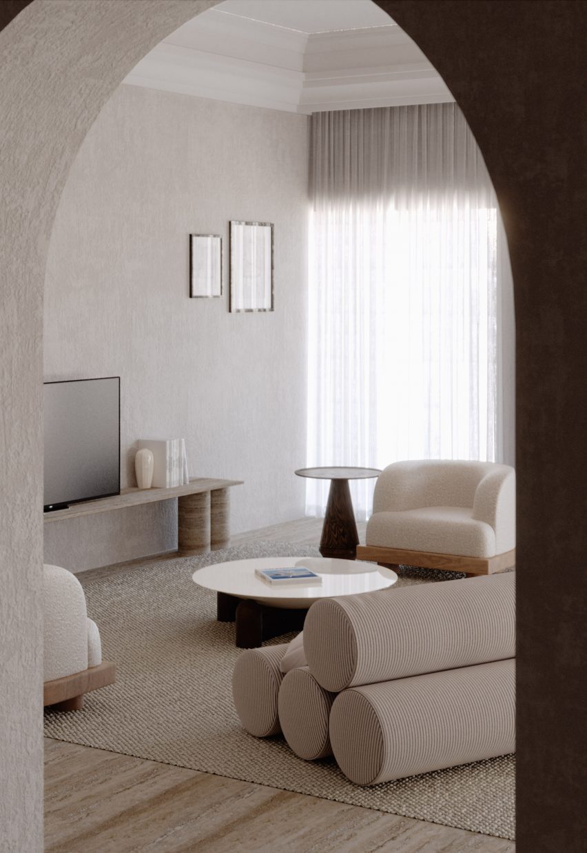 Neutral-hued living room centred on circular white Spirit coffee table by Monogram via Galerie Revel