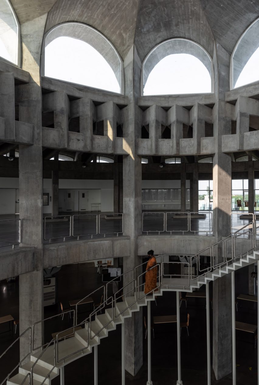 Interior image of a concrete atrium at the factory
