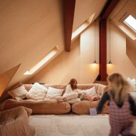 Studiotwentysix adds plywood-lined loft extension to Edwardian family home