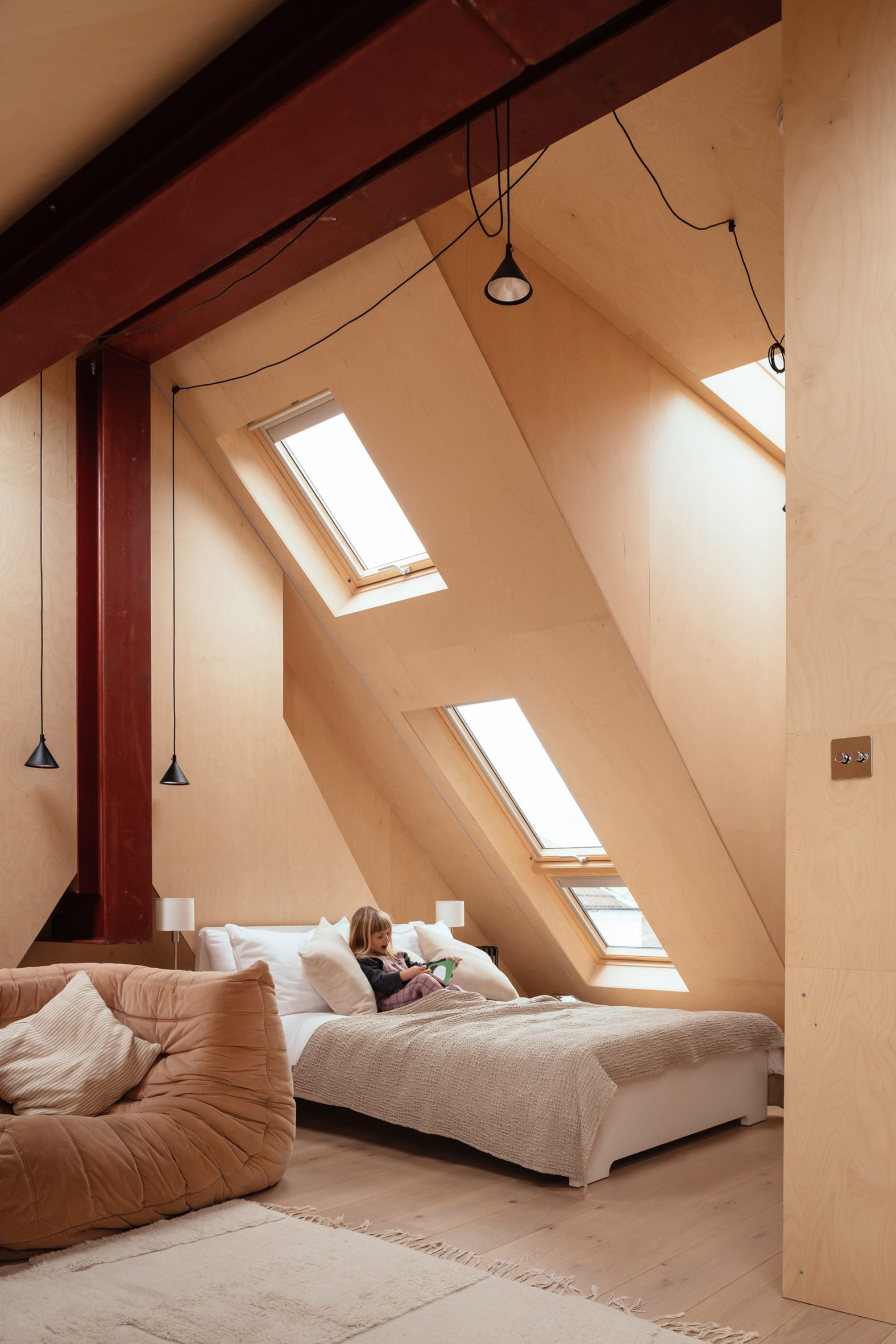 Velux windows line the sloping roof 