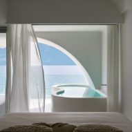 Bathrooms inside Sumei Skyline Coast hotel by GS Design