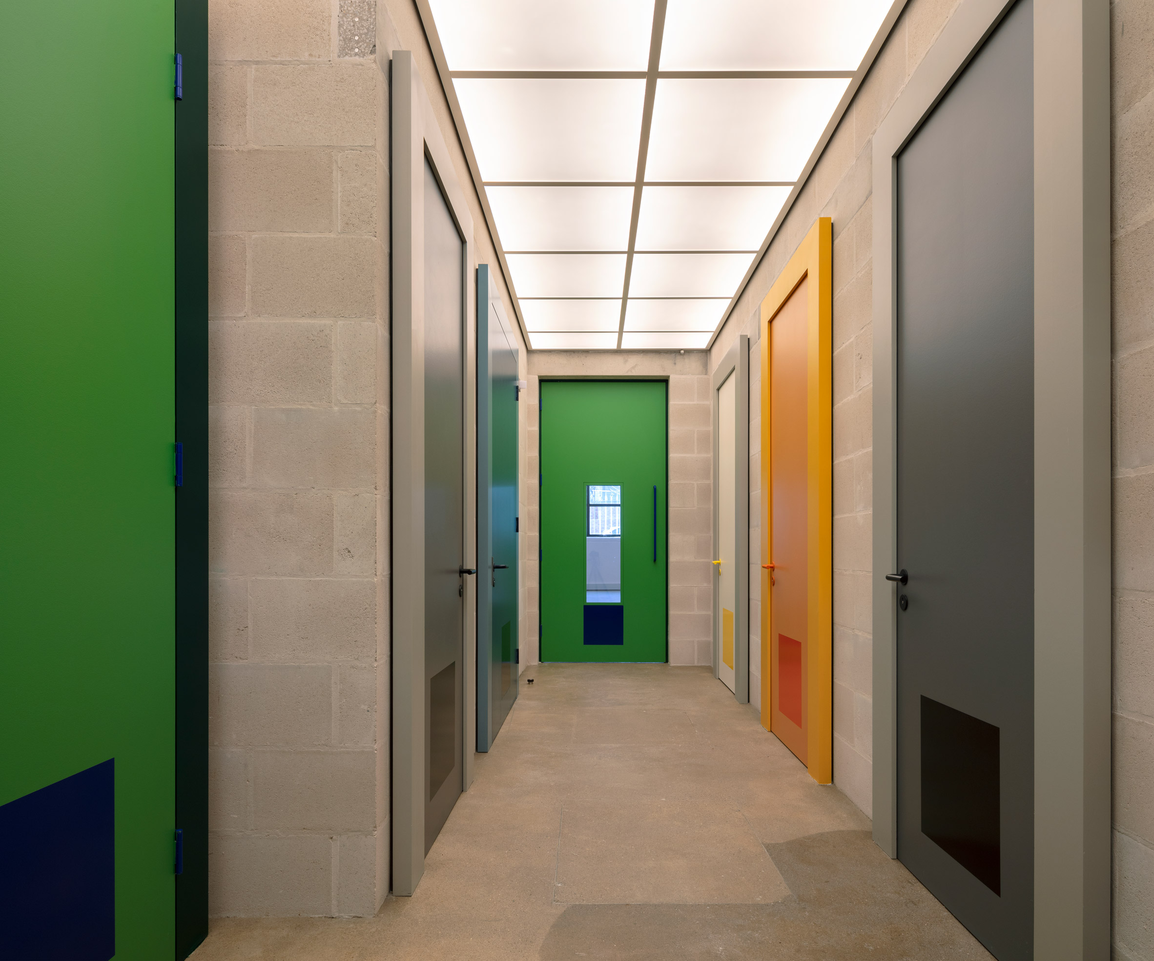 Colourful doors in Lazlo offices by Henley Halebrown