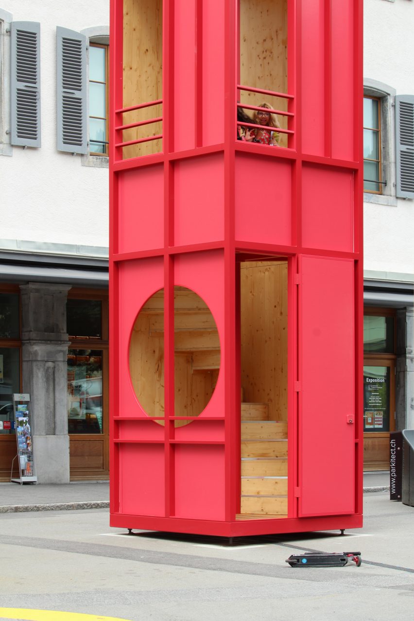 A slim, red pavilion