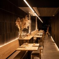 Graypants converts slender space near Seattle into Tomo restaurant