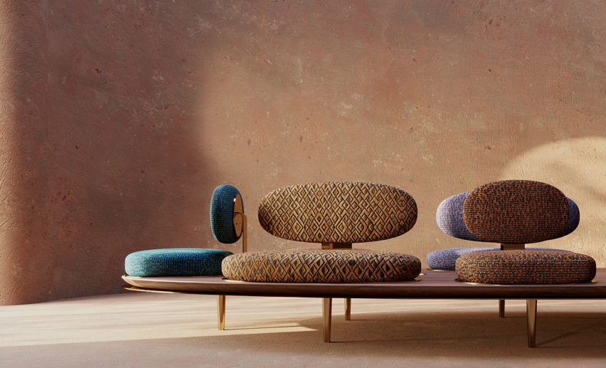 Geometric patterned textiles on elliptic seats of Tribu sofa by Studioforma