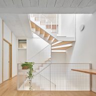 Vallribera Arquitectes contrasts heavy and light finishes at compact home in Barcelona