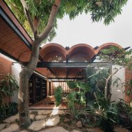Vaulted brick roof spans Intermediate House in Paraguay by Equipo de Arquitectura