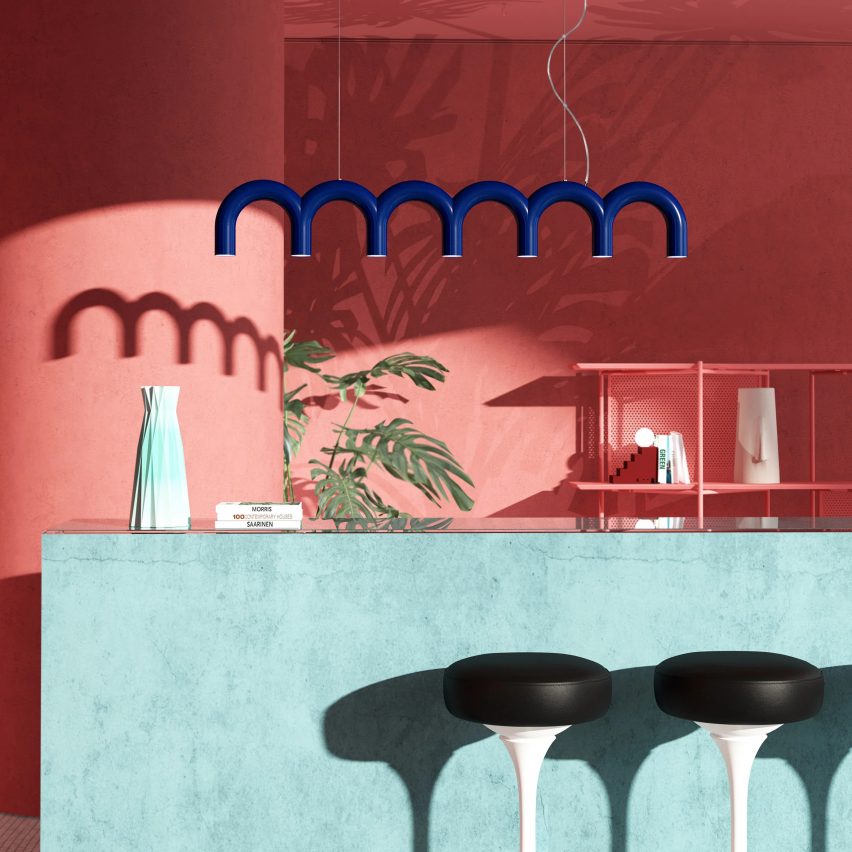 Arch pendant lamp by Oblure in blue used in a pink bar