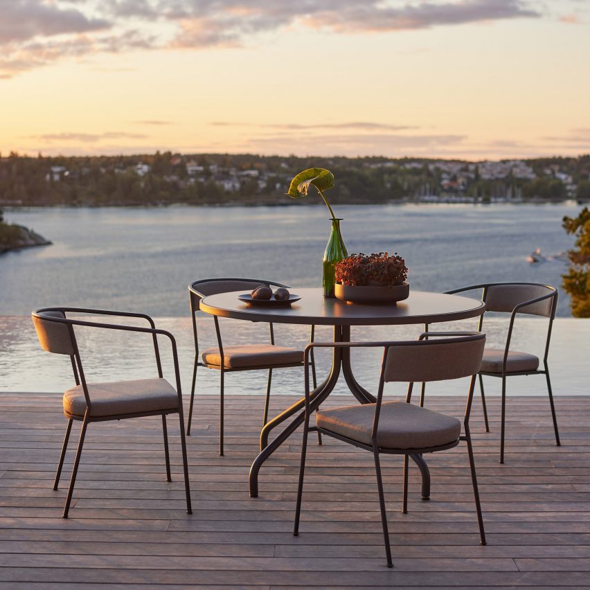 Arholma outdoor table and four chairs on decking
