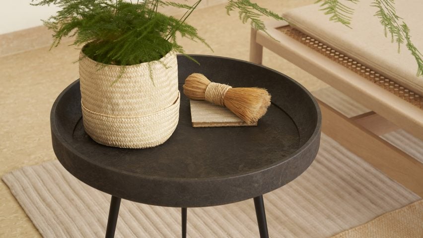 Bowl table by Ayush Kasliwal for Mater made with waste coffee shells, holding a plant and twine
