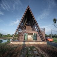 Tung Jai Ork Baab stacks shipping containers to create holiday home in Thailand