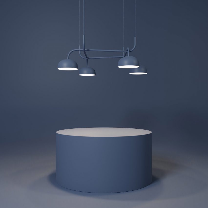 A photograph of the blue grey Curve Crown light by Zero Lighting