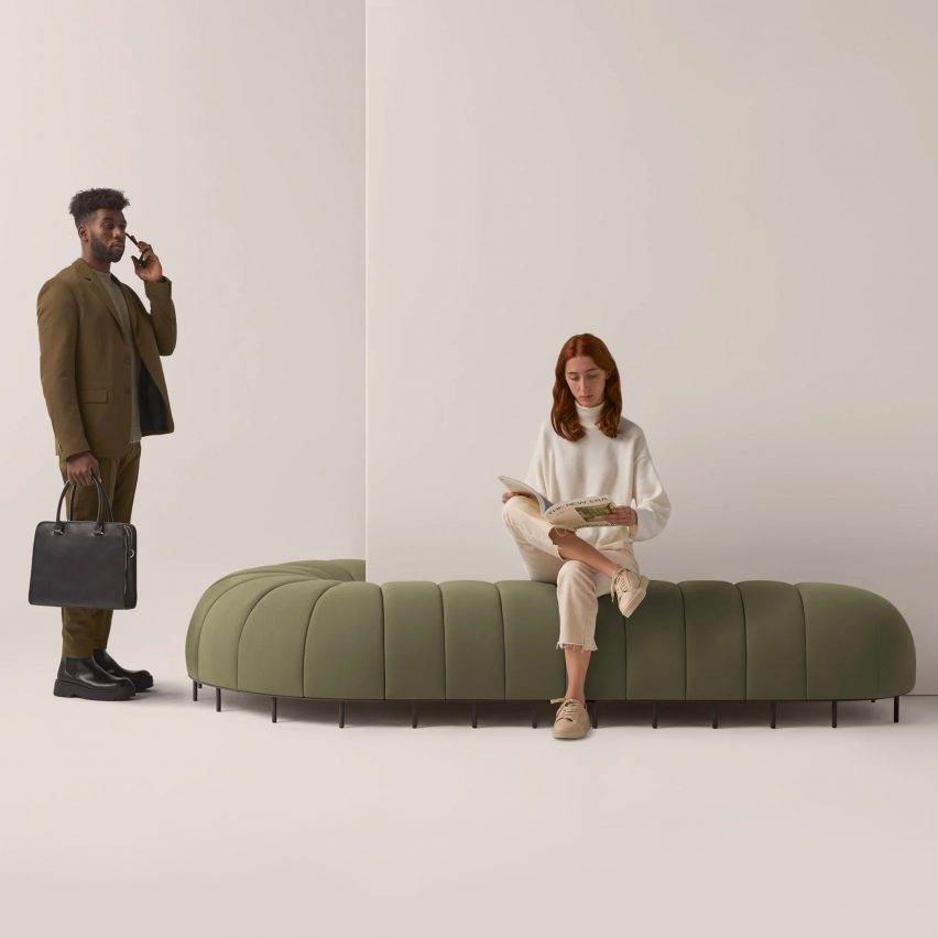 Worm sofa bench by Missana in green with two people
