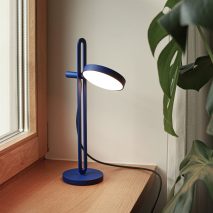 Blue Echo lamp on a wooden window sill