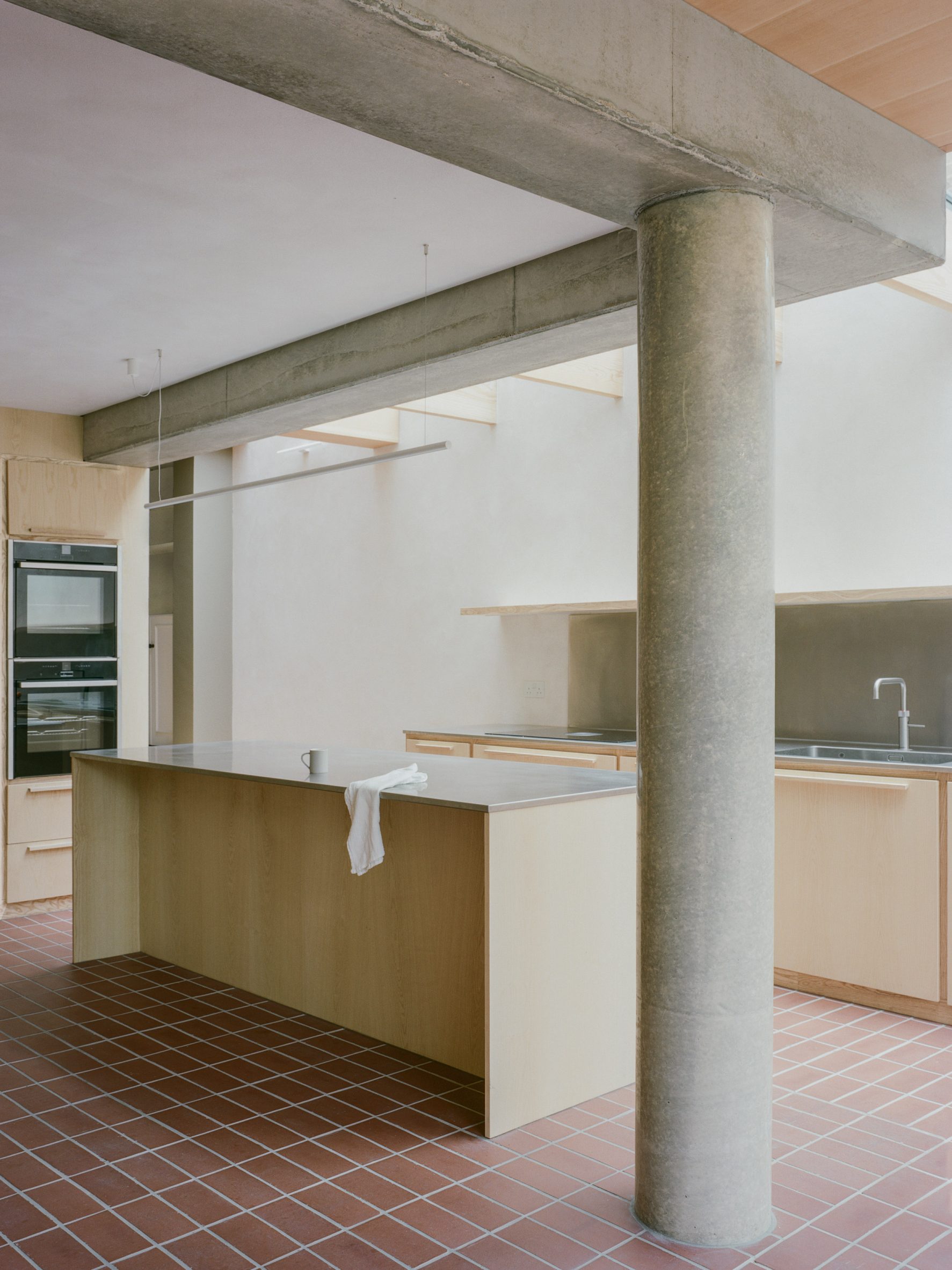 Kitchen island in Herne Hill House extension by TYPE